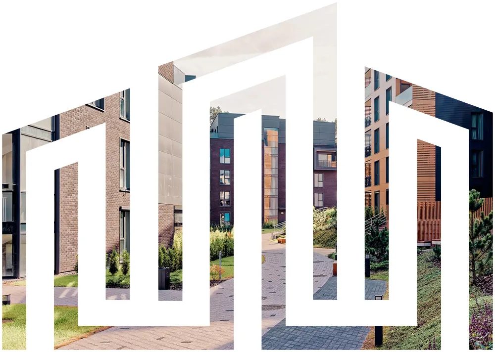 Nemovos logosymbol i hvidt lagt over et foto af moderne boligblokke med grønne gårdarealer